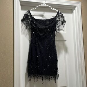 black sequin dress